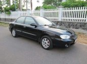 Bán Kia Spectra đời 2005, màu đen, giá 144tr