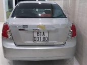 Cần bán Chevrolet Lacetti đời 2011, màu bạc còn mới