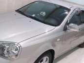 Cần bán Chevrolet Lacetti đời 2011, màu bạc còn mới