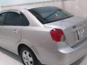 Cần bán Chevrolet Lacetti đời 2011, màu bạc còn mới