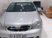 Cần bán Chevrolet Lacetti đời 2011, màu bạc còn mới