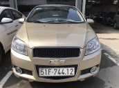 Bán Chevrolet Aveo LT 1.5MT màu vàng cát số sàn sản xuất 2016 biển Sài Gòn đi 48000km