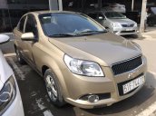 Bán Chevrolet Aveo LT 1.5MT màu vàng cát số sàn sản xuất 2016 biển Sài Gòn đi 48000km