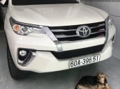 Bán ô tô Toyota Fortuner 2.7V 4x2 AT đời 2017, màu trắng, mua từ hãng gia đình đi rất kỹ chưa trầy xước