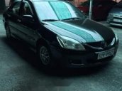 Cần bán Mitsubishi Lancer 2004, màu đen, xe nhập