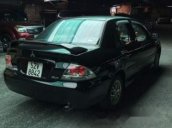 Cần bán Mitsubishi Lancer 2004, màu đen, xe nhập