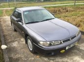 Cần bán Mazda 626 sản xuất 1995, màu xám, xe nhập