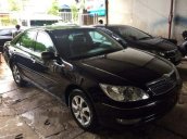 Cần bán xe cũ Toyota Camry sản xuất 2004, màu đen như mới