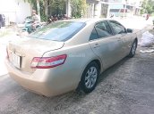 Bán Toyota Camry 2.5LE năm 2010, màu vàng, nhập khẩu 