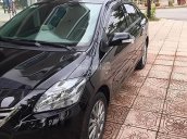 Cần bán xe Toyota Vios 1.5E năm 2013, màu đen xe gia đình