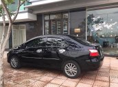 Cần bán xe Toyota Vios 1.5E năm 2013, màu đen xe gia đình