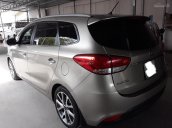 Bán Kia Rondo DMT 2015, màu vàng cát, giá thương lượng, hỗ trợ góp