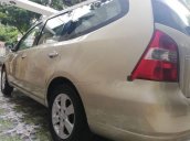 Bán ô tô Nissan Grand livina đời 2012, màu vàng cát, nhập khẩu nguyên chiếc còn mới