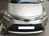 Gia đình bán Toyota Vios E đời 2014, màu vàng cát