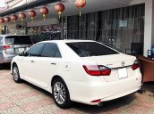 Bán xe Camry 2.0E tự động mua tháng 4/2018, màu trắng cao cấp, đi 6000Km