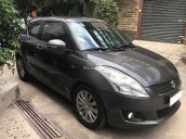 Bán xe Suzuki Swift màu xám đen, nhập khẩu đời 2014,06 túi khí, 04 thắng đĩa trước sau