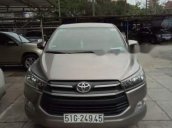 Cần bán lại xe Toyota Innova đời 2017, màu nâu vàng  