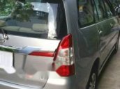 Cần bán xe Toyota Innova đời 2014, màu bạc đẹp như mới