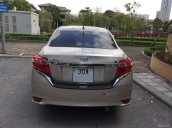 Gia đình cần bán Toyota Vios sản xuất 2014, số sàn, màu vàng cát, chính chủ