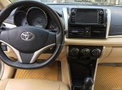 Gia đình cần bán Toyota Vios sản xuất 2014, số sàn, màu vàng cát, chính chủ