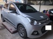 Cần bán lại xe Hyundai Grand i10 1.2AT đời 2015, màu bạc, xe nhập 