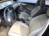 Cần bán gấp Toyota Altis 2009 số sàn, màu đen