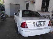 Bán xe Ford Laser Ghia 1.8 AT đời 2004, màu trắng số tự động giá cạnh tranh