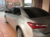 Cần bán lại xe Toyota Altis AT, sx 2014, màu bạc