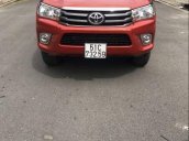 Bán ô tô Toyota Hilux 2.5E năm 2016, màu đỏ, xe nhập số sàn