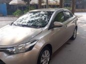 Bán xe Toyota Vios E đời 2016, màu vàng, số sàn