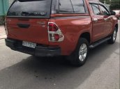 Bán ô tô Toyota Hilux 2.5E năm 2016, màu đỏ, xe nhập số sàn