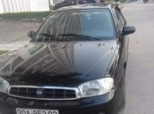 Cần bán Kia Spectra sản xuất 2003, màu đen, 110 triệu