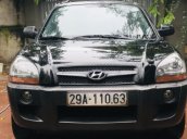 Bán xe Hyundai Tucson 2.0 AT sản xuất năm 2009, màu đen  