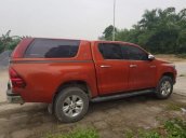 Bán xe Toyota Hilux 3.0 4x4 AT năm 2016, màu đỏ chính chủ