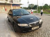 Bán Mazda 626 đời 2000, màu đen, xe nhập số sàn 