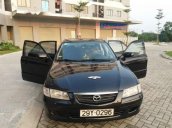 Bán Mazda 626 đời 2000, màu đen, xe nhập số sàn 