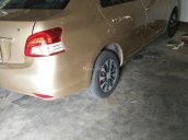 Cần bán xe Toyota Vios 1.5 MT đời 2010, màu vàng như mới