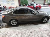 Cần bán xe BMW 3 Series 320i sản xuất năm 2014, màu xám, giá 900tr