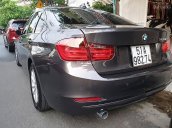 Cần bán xe BMW 3 Series 320i sản xuất năm 2014, màu xám, giá 900tr