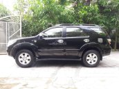 Bán em Fortuner 2011 máy xăng, màu đen, xe đẹp long lanh