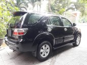 Bán em Fortuner 2011 máy xăng, màu đen, xe đẹp long lanh