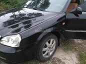 Cần bán lại xe Daewoo Magnus 2002, màu đen