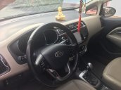 Bán ô tô Kia Rio sản xuất năm 2014, đăng ký lần đầu 2015, màu nâu, xe gia đình