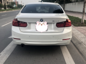 Bán xe BMW 3 Series sản xuất 2013 màu trắng, 880 triệu, nhập khẩu nguyên chiếc