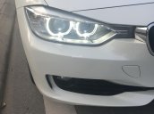 Bán xe BMW 3 Series sản xuất 2013 màu trắng, 880 triệu, nhập khẩu nguyên chiếc