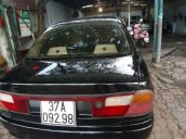 Bán xe Mazda 323 đời 2000, màu đen  