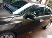 Cần bán gấp Kia Forte sản xuất 2013, màu nâu