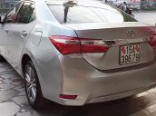 Cần bán gấp Toyota Corolla Altis 1.8G đời 2015, màu bạc, giá 680tr