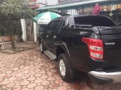 Cần bán Mitsubishi Triton năm sản xuất 2015, màu đen, xe nhập xe gia đình