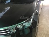 Cần bán xe Toyota Corolla altis 1.8G AT năm sản xuất 2015, màu đen 